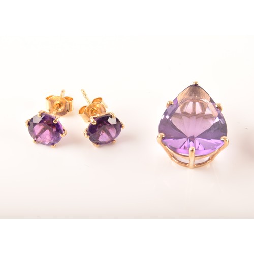 89 - A 9ct yellow gold pendant set with a large pear cut amethyst, together with a pair of 9ct yellow gol... 