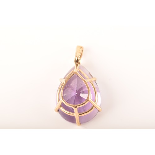 89 - A 9ct yellow gold pendant set with a large pear cut amethyst, together with a pair of 9ct yellow gol... 