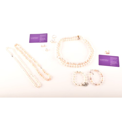 105 - A collection of cultured pearl jewellery, including two large pearl necklaces with magnetic fittings... 