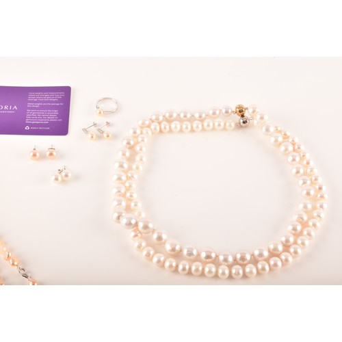 105 - A collection of cultured pearl jewellery, including two large pearl necklaces with magnetic fittings... 