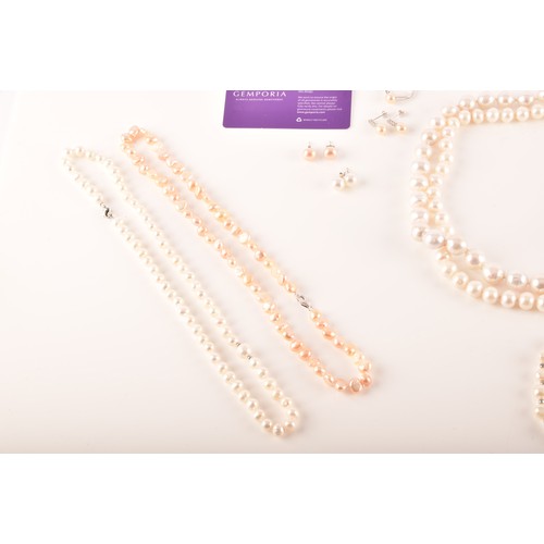 105 - A collection of cultured pearl jewellery, including two large pearl necklaces with magnetic fittings... 