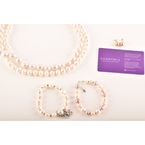 105 - A collection of cultured pearl jewellery, including two large pearl necklaces with magnetic fittings... 