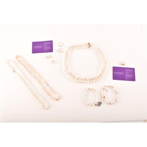 105 - A collection of cultured pearl jewellery, including two large pearl necklaces with magnetic fittings... 