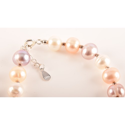 105 - A collection of cultured pearl jewellery, including two large pearl necklaces with magnetic fittings... 