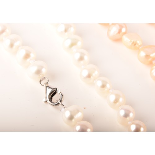 105 - A collection of cultured pearl jewellery, including two large pearl necklaces with magnetic fittings... 