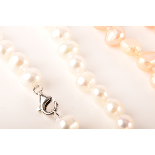 105 - A collection of cultured pearl jewellery, including two large pearl necklaces with magnetic fittings... 