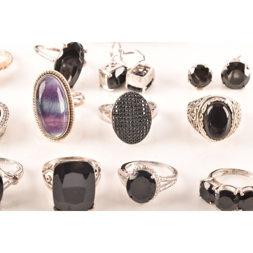 106 - A large collection of silver boi ploi black spinel jewellery, including nine rings, six pairs of ear... 