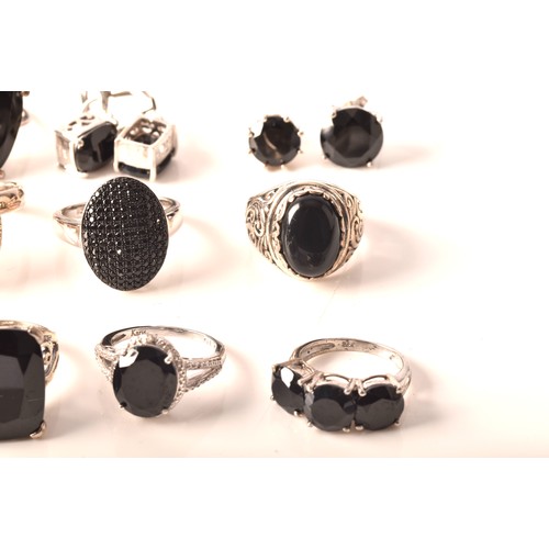 106 - A large collection of silver boi ploi black spinel jewellery, including nine rings, six pairs of ear... 