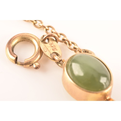 26 - A vintage 9ct yellow gold bracelet, set with thirteen nephrite cabochons, 18cm long.