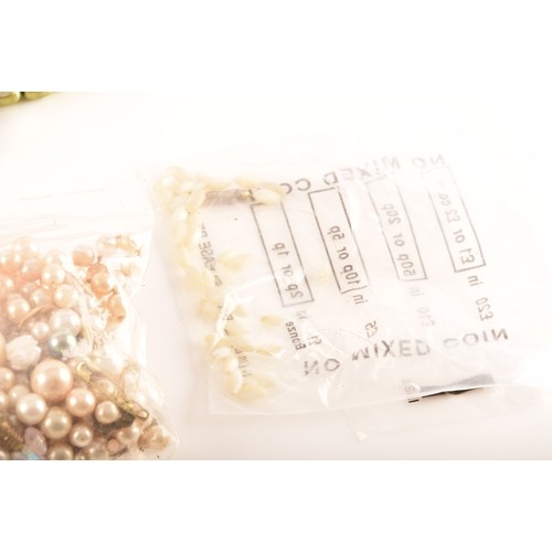 54 - A large quantity of cultured pearl jewellery including many necklaces, chokers, bracelets, loose pea... 