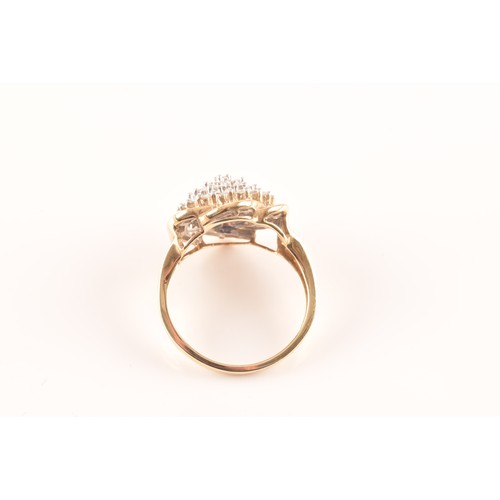 55 - A 9ct yellow gold diamond flower cluster ring, featuring a myriad of brilliant cut diamonds, further... 