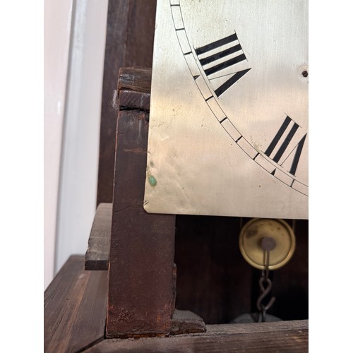 353 - A George III mahogany long case clock by James Wild of Soho, London. The arched top case with reeded... 