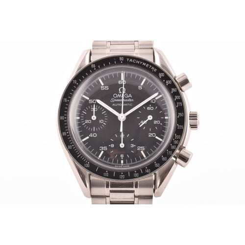 An Omega Speedmaster Reduced reference 175.0032 automatic stainless steel chronograph wristwatch, the black dial with luminous baton markers, hands and centre chronograph sweep, with triple subsidiary dials for running seconds, minutes and hours, in stainless steel case with stainless steel bracelet, the 1140 automatic 46 jewel calibre 2890-2 movement stamped P8A, the case back stamped Omega and numbered 175.0032.1 / 175.0033.1, the bracelet number 1469. 39mm case.
