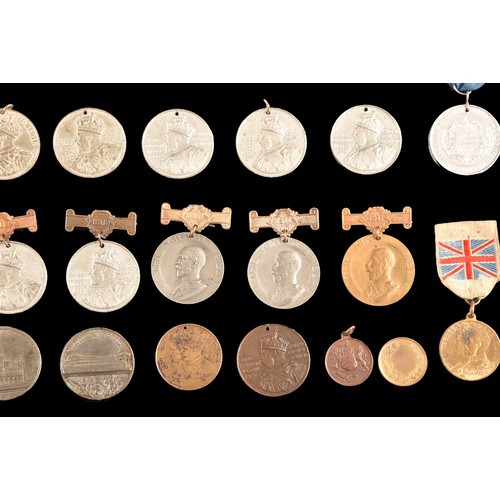 208 - A large collection of attendance medals including The King's Medal Attendance awards for London Coun... 