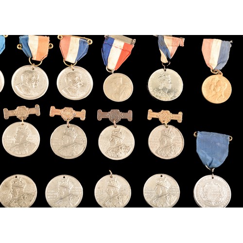 208 - A large collection of attendance medals including The King's Medal Attendance awards for London Coun... 