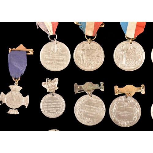 208 - A large collection of attendance medals including The King's Medal Attendance awards for London Coun... 
