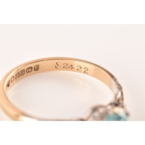 15 - An 9ct yellow gold and white metal solitaire ring, set to centre with a round cut zircon with an app... 