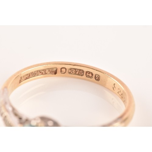 15 - An 9ct yellow gold and white metal solitaire ring, set to centre with a round cut zircon with an app... 