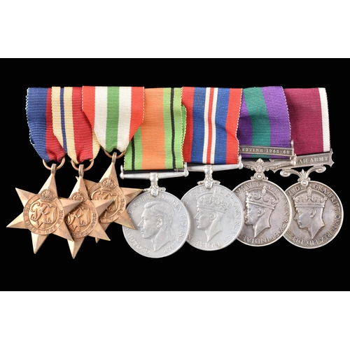 A World War II and later GSM LSGC seven medal group, awarded to: Warrant Officer Second Class P. G. Flegg, Essex Regiment. Comprising: The 1939-1945 Star, The Africa Star, The Italy Star, The Defence Medal, the 1939-1945 War Medal, a George VI General Service Medal with Palestine 1945-48 clasp (6008726 W. O. Cl. 2. P. G. Flegg. Essex.); and a George VI Regular Army Long Service and Good Conduct medal (6008726 W. O. Cl. 2. P. G. Flegg. Essex.), mounted for wear on a bar.