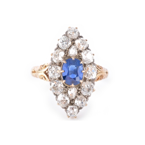 A Victorian yellow gold sapphire and diamond marquise cluster ring, set to centre with a cushion shape natural unheated sapphire with an approximate weight of 1.35 carats, flanked by two rose cut diamonds with a combined approximate weight of 0.15 carats, surrounded by twelve cushion shape old mine diamonds with a combined approximate weight of 2.80 carats, size T, accompanied by Gem & Pearl Laboratory report #26083.