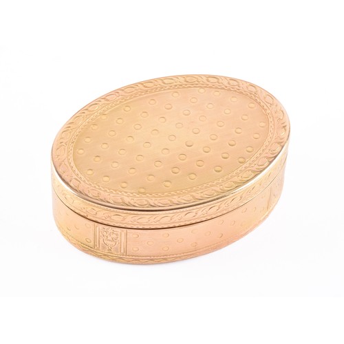 A French antique yellow gold trinket box, of oval form, the hinged lid and body with engine-turned dotted surface, engraved foliate borders, and panelled sides decorated with stylised floral and foliate motifs rising from small urns, marked 'PG' flanked by two fleur-de-lis motifs, 6.2 cm long, 4.4 cm width.