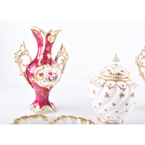 337 - A collection of ceramics including two Coalport Rococo-style vases, both of baluster form with flare... 
