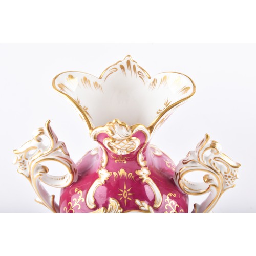 337 - A collection of ceramics including two Coalport Rococo-style vases, both of baluster form with flare... 
