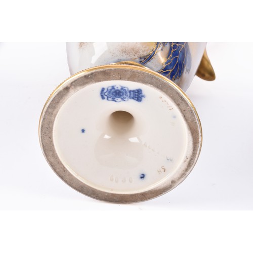 338 - A pair of Doulton Burslem jardiniere's, cobalt blue ground with extensive gilt floral scroll decorat... 