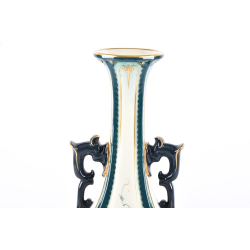 339 - A Hadley's Worcester Faience vase, the U-shaped body with extended waisted neck decorated with cream... 