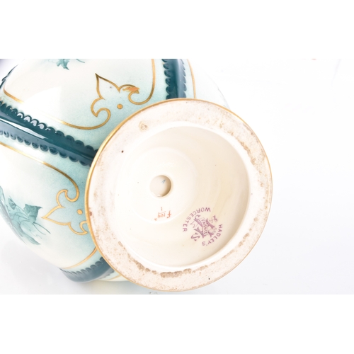 339 - A Hadley's Worcester Faience vase, the U-shaped body with extended waisted neck decorated with cream... 