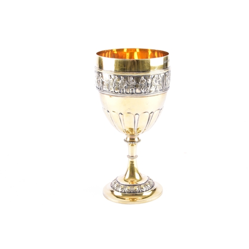 A fine Victorian silver gilt chalice, hallmarked Birmingham 1874, by Frederick Elkington, decorated with a band of classical Roman figures, the fluted body, the stem with beaded bands, the base with egg and dart decoration, fully hallmarked and part marked to base. 24.5 cm high. 