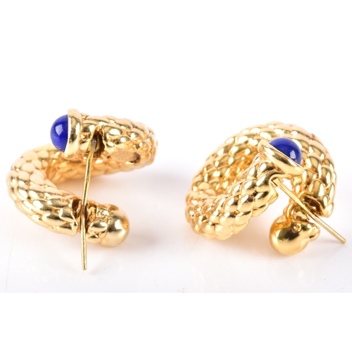 A pair of yellow gold hoop earrings by Fope, Novecento weave, each earring is accented at the top with a round cabochon blue stone, fitted with posts, approximate length 2.5 cm, marked 'FOPE', 750,.