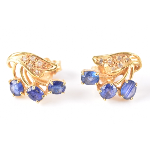 69 - A pair of 9ct yellow gold and multigem floral cluster earrings, (one lacking a stone) together with ... 