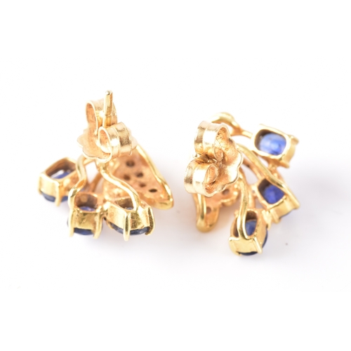 69 - A pair of 9ct yellow gold and multigem floral cluster earrings, (one lacking a stone) together with ... 