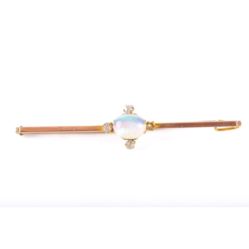 65 - A 9ct yellow gold opal and diamond brooch, set with an oval cabochon opal measuring approximately 8.... 