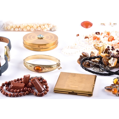 38 - An amber pendant with a yellow gold bale, a pair of 9ct yellow gold pearl screw back earrings, toget... 