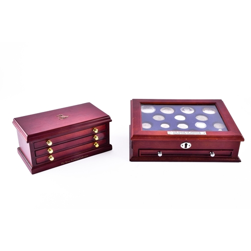 109 - A small collection of silver coins and farthings, twenty in total, housed in a miniature set of coll... 