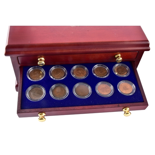 109 - A small collection of silver coins and farthings, twenty in total, housed in a miniature set of coll... 