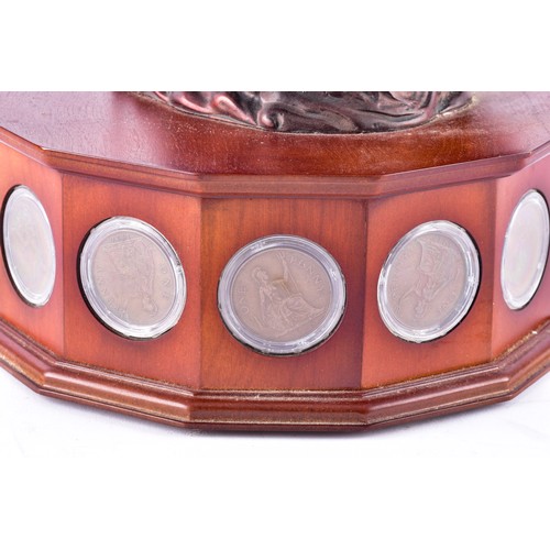 109 - A small collection of silver coins and farthings, twenty in total, housed in a miniature set of coll... 