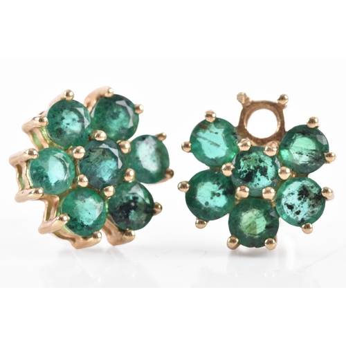35 - A pair of 10ct yellow gold floral emerald cluster earrings, (one loose stone), each 1 cm diameter, w... 