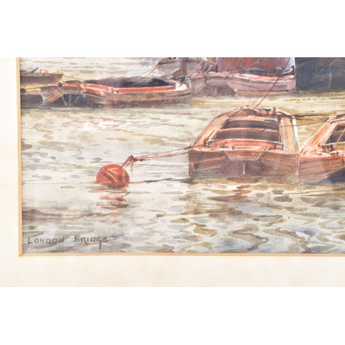 228 - Frederick William Scarborough (British, 1860-1939)'The Pool of London' A watercolour view of boats s... 