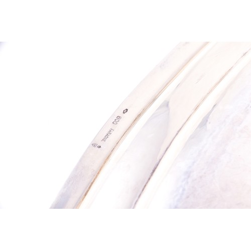 164 - A continental 800 silver large elongated oval tray, with a plain polished surface, within a narrow b... 