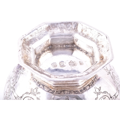 171 - A continental silver quaich, of octagonal form with flared sides, the exterior finely engraved with ... 