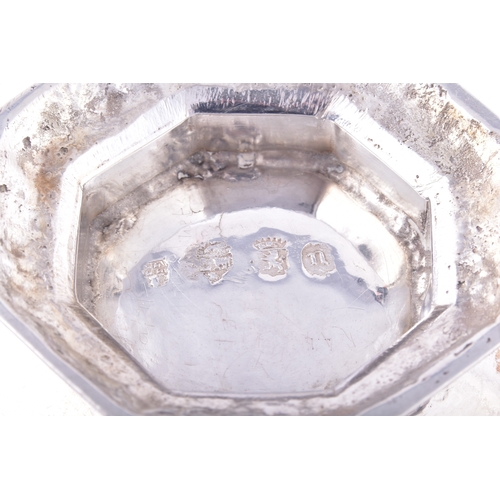 171 - A continental silver quaich, of octagonal form with flared sides, the exterior finely engraved with ... 