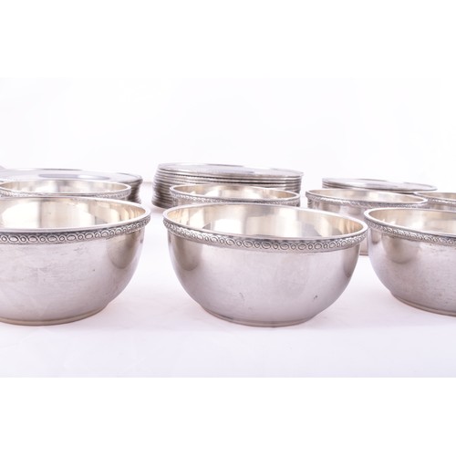 145 - A set of twelve continental 800 silver finger bowls, 12 cm diameter, twelve small plates, 16 cm diam... 