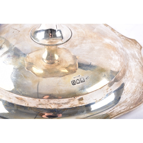150 - A George V silver tazza, hallmarked for London 1915, 19 cm diameter, 12.5 cm high, together with two... 