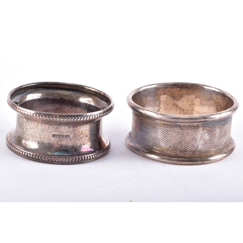 150 - A George V silver tazza, hallmarked for London 1915, 19 cm diameter, 12.5 cm high, together with two... 