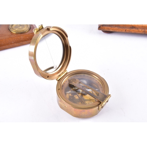 214 - Two late 19th to early 20th century brass postal balance scales, each with twin circular pans on a b... 