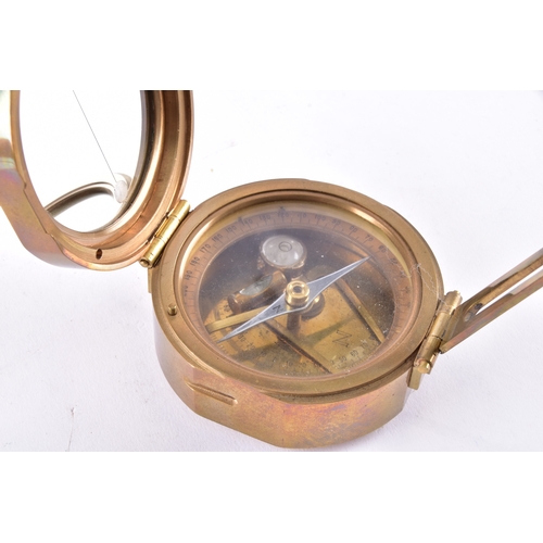 214 - Two late 19th to early 20th century brass postal balance scales, each with twin circular pans on a b... 