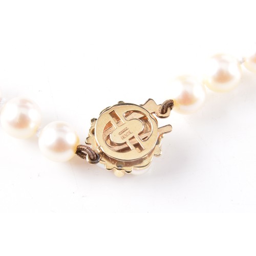 47 - A cultured pearl necklace with a 9ct yellow gold sapphire set clasp, 46 cm long, together with a pai... 